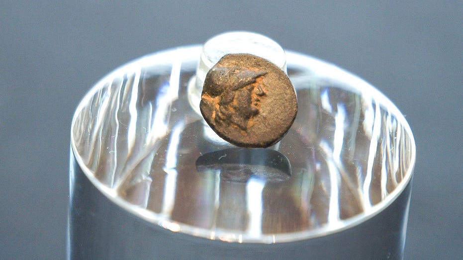 Teen stumbles on mysterious coin from legendary city, puzzling archaeologists over its journey Melbourne School